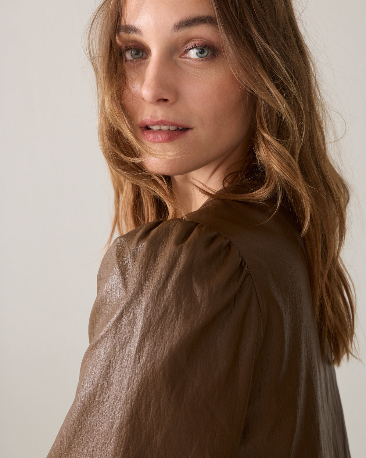 Puff sleeve top faux leather