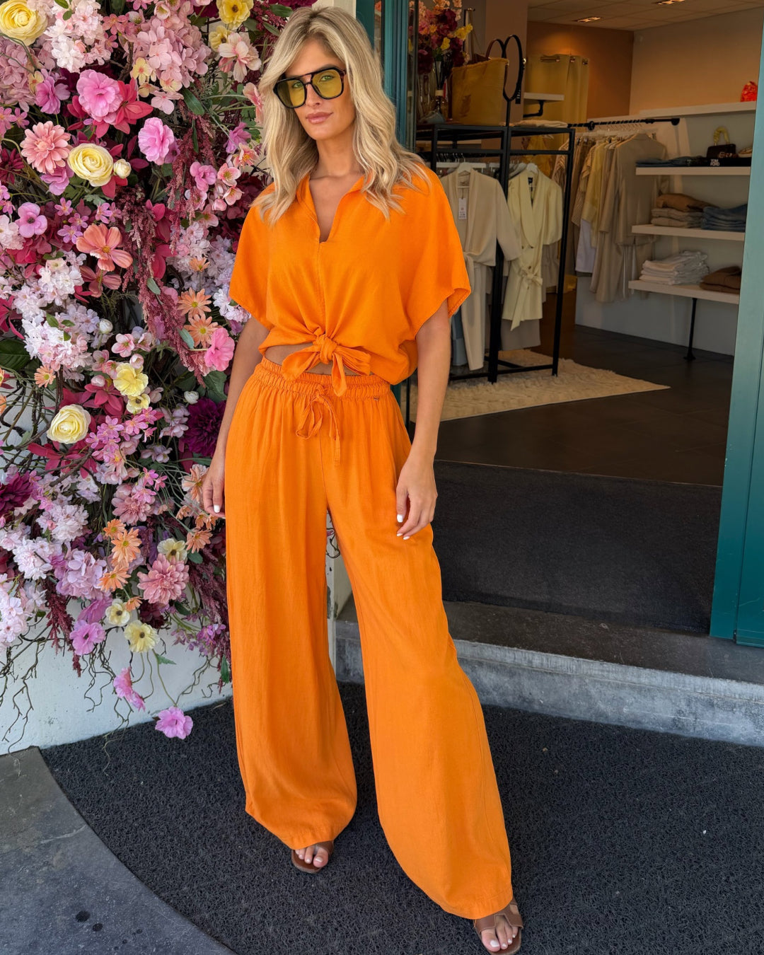 Geknoopte blouse oranje